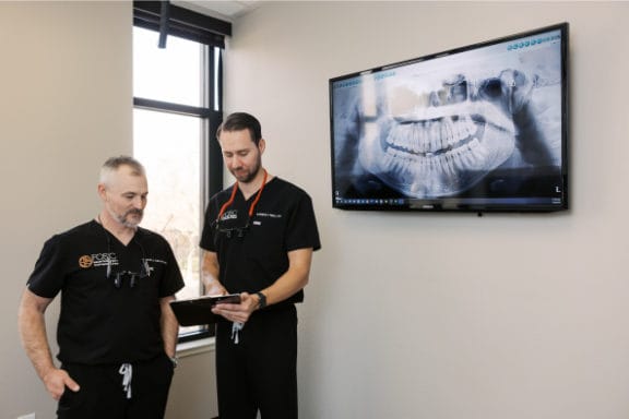 Doctors reviewing an X-Ray